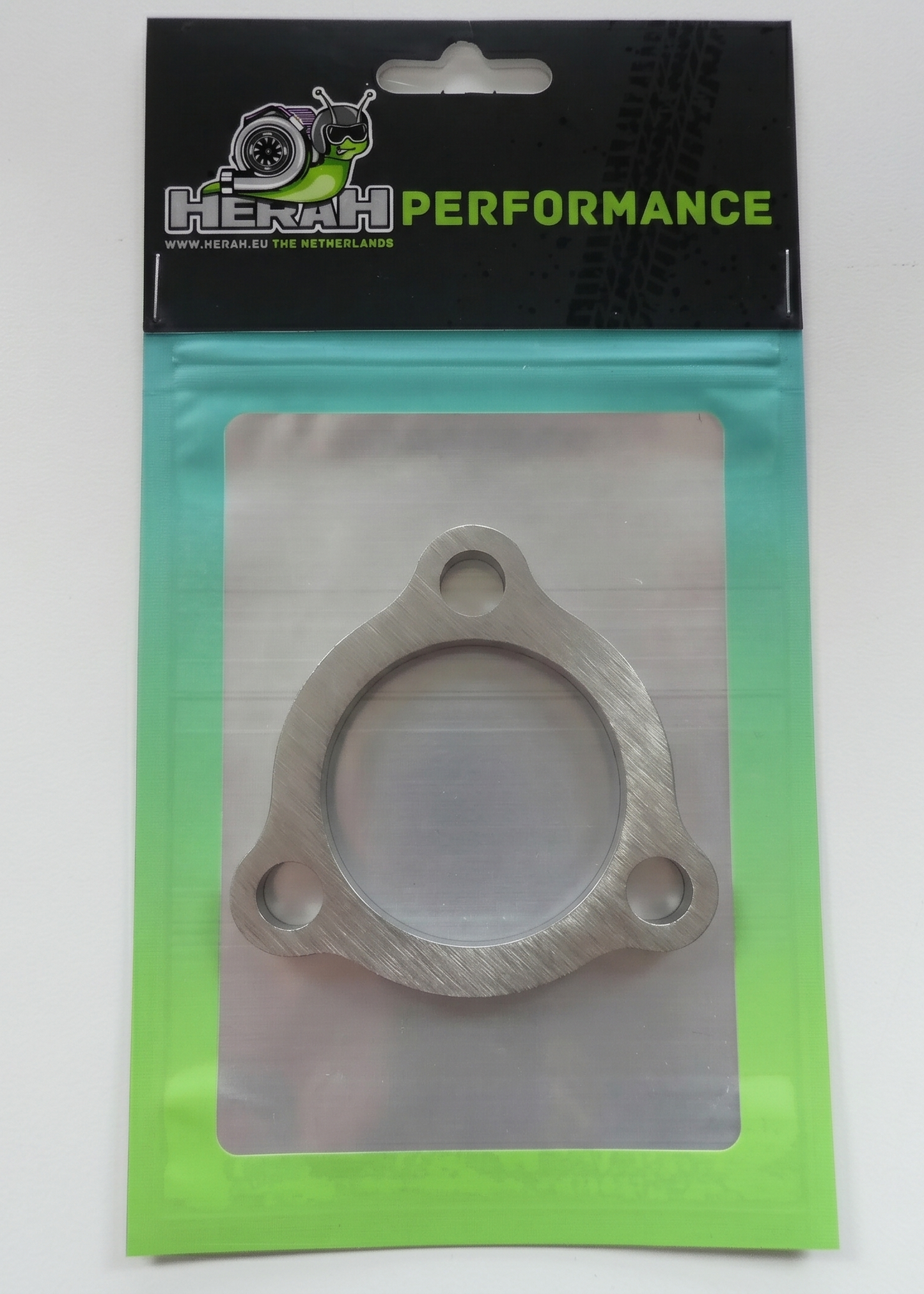 Turbo flange on a Herah Performance packaging with a clear window