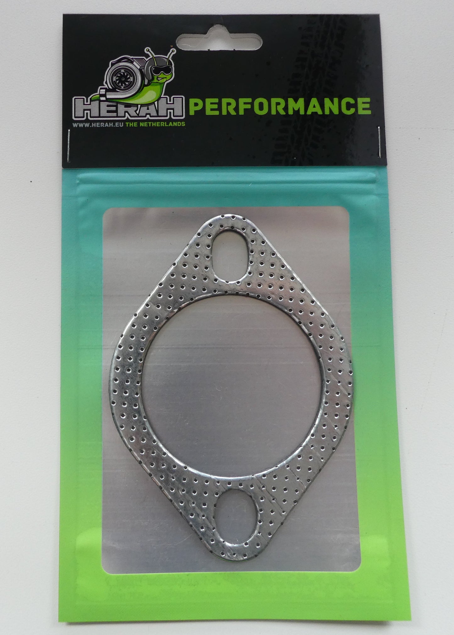 Metal gasket on a green and black HERAH Performance package