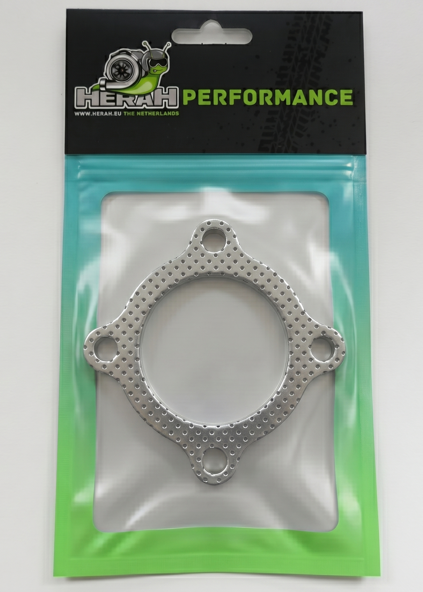 Metallic gasket in packaging with 'HERAH PERFORMANCE' branding on a white background