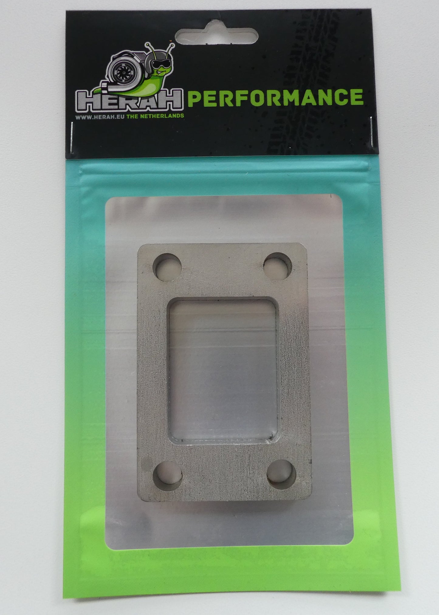 Turbo flange on a Herah Performance packaging with a clear window