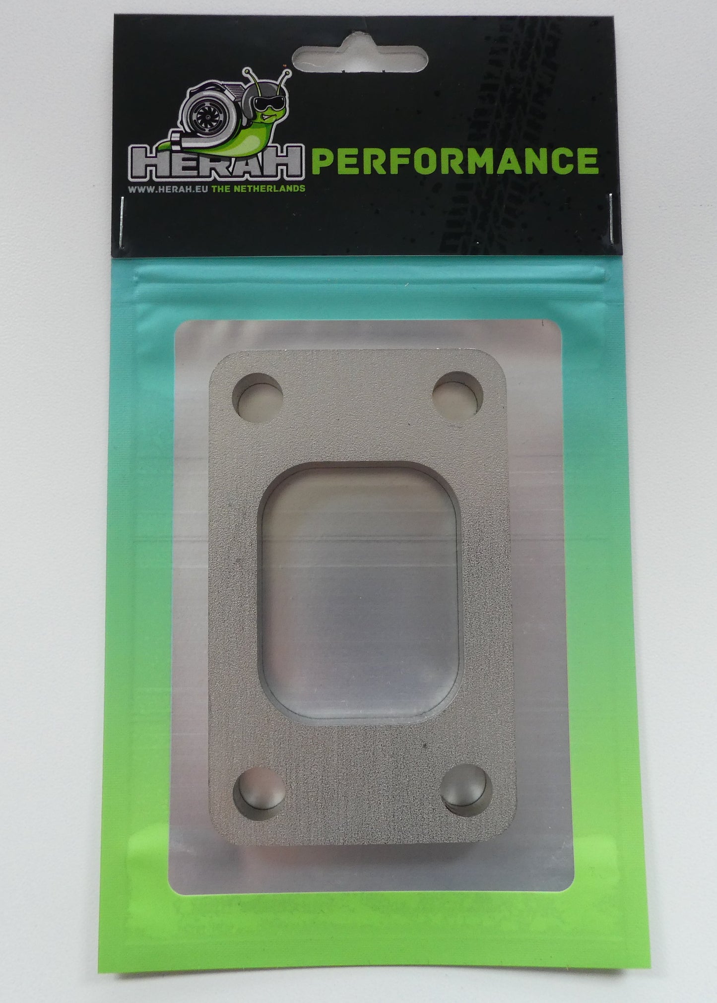 Turbo flange on a Herah Performance packaging with a clear window