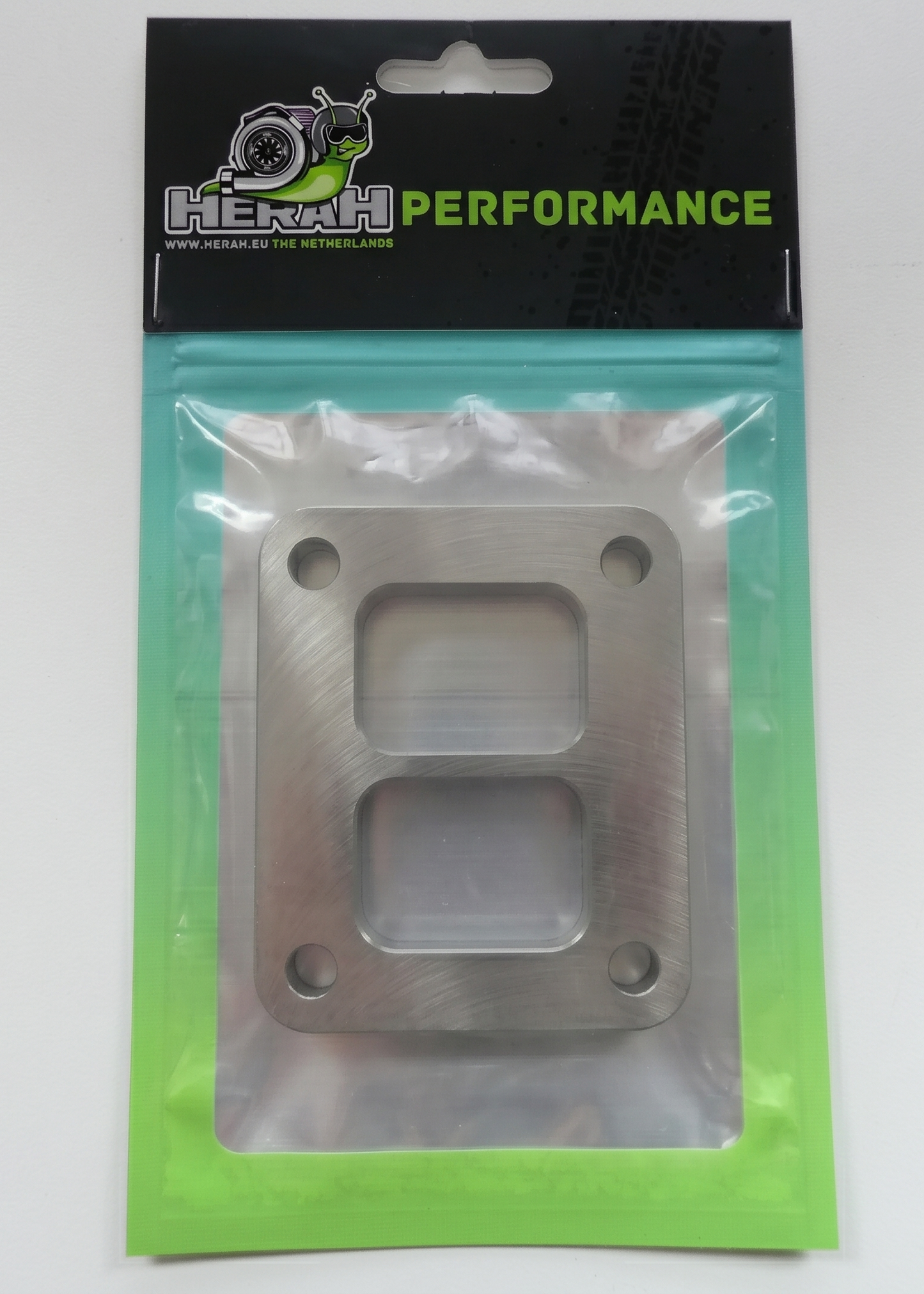 Turbo flange on a Herah Performance packaging with a clear window