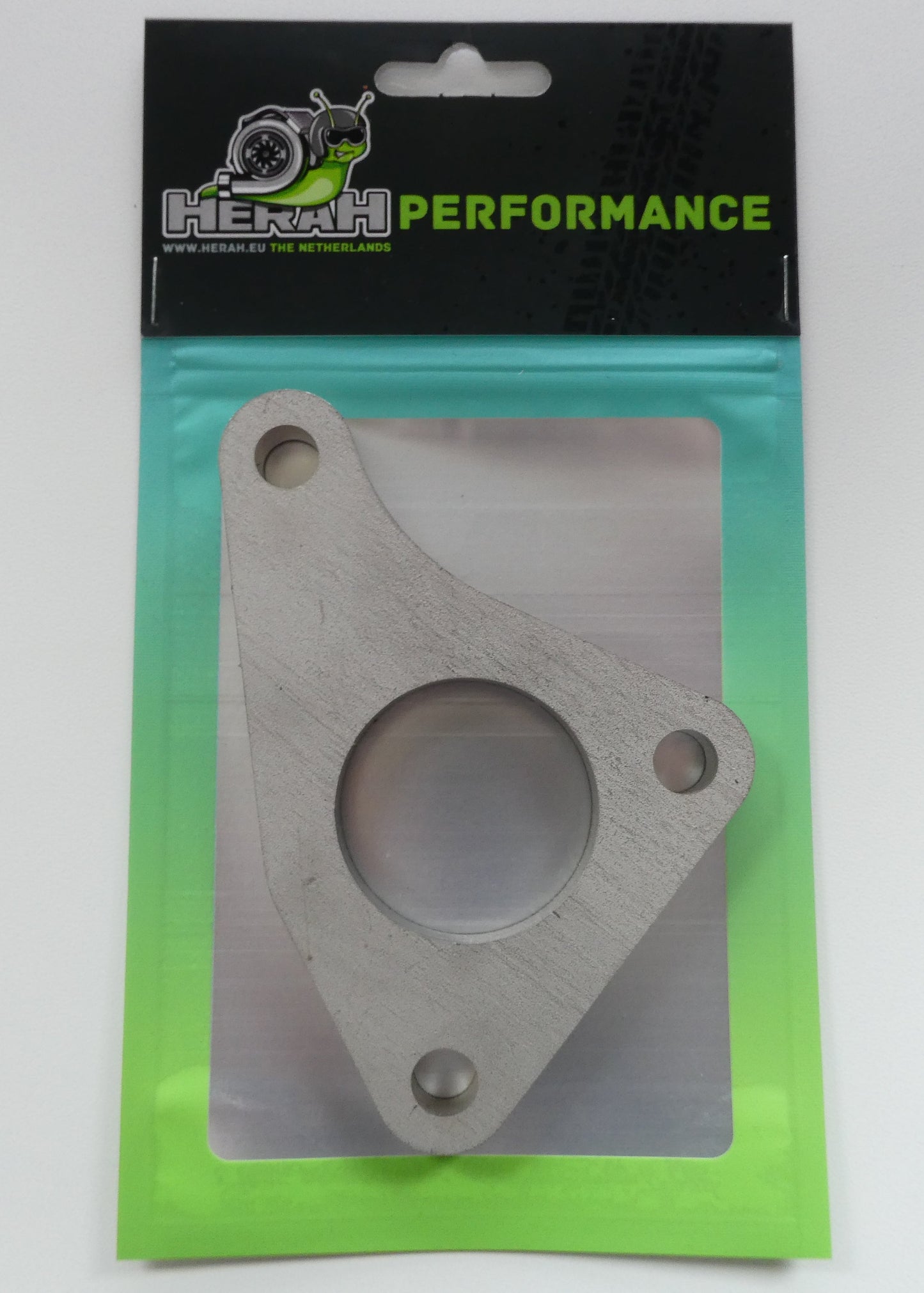 Turbo flange on a Herah Performance packaging with a clear window