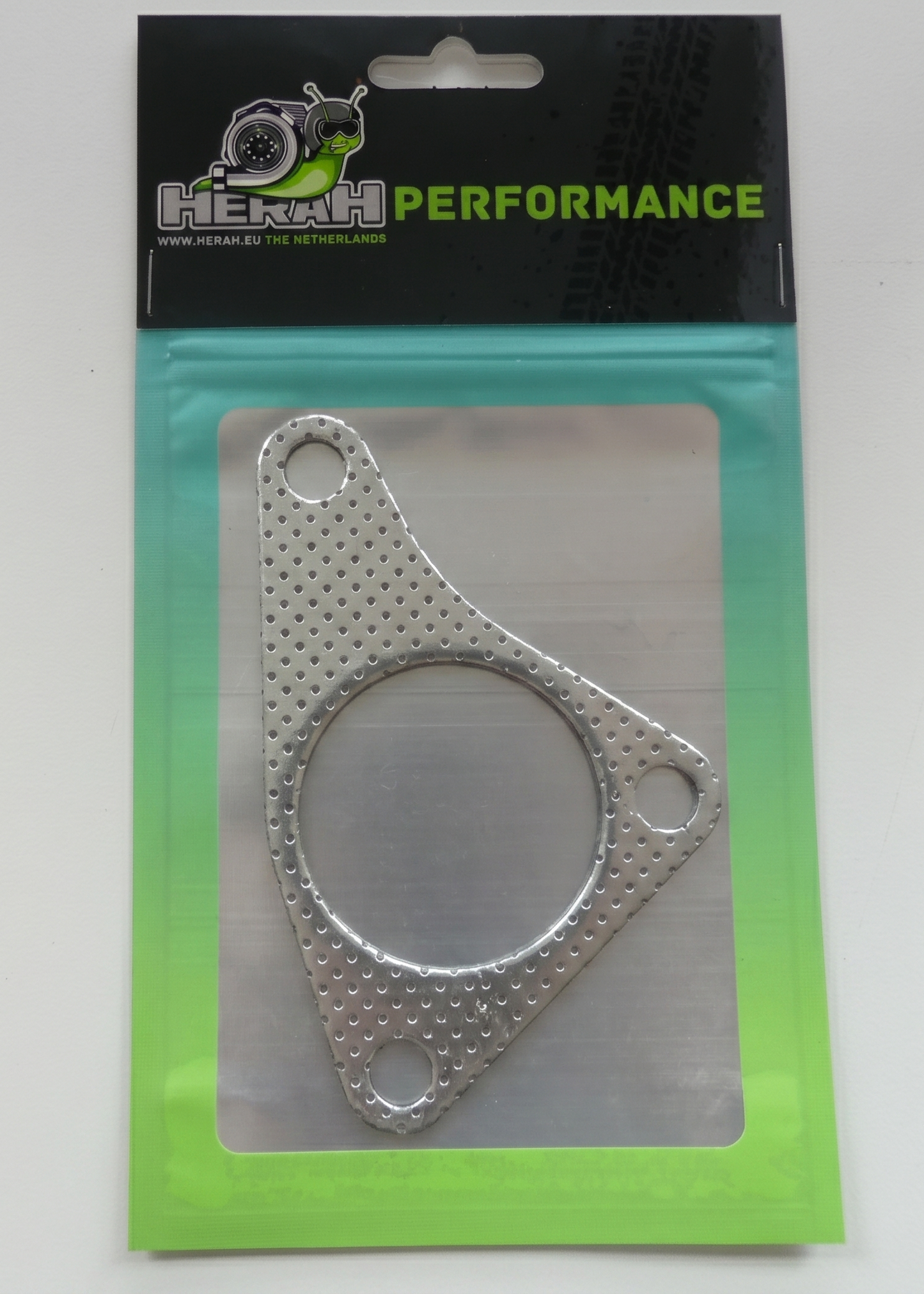 Metal gasket in packaging with 'Herah Performance' branding on a white background