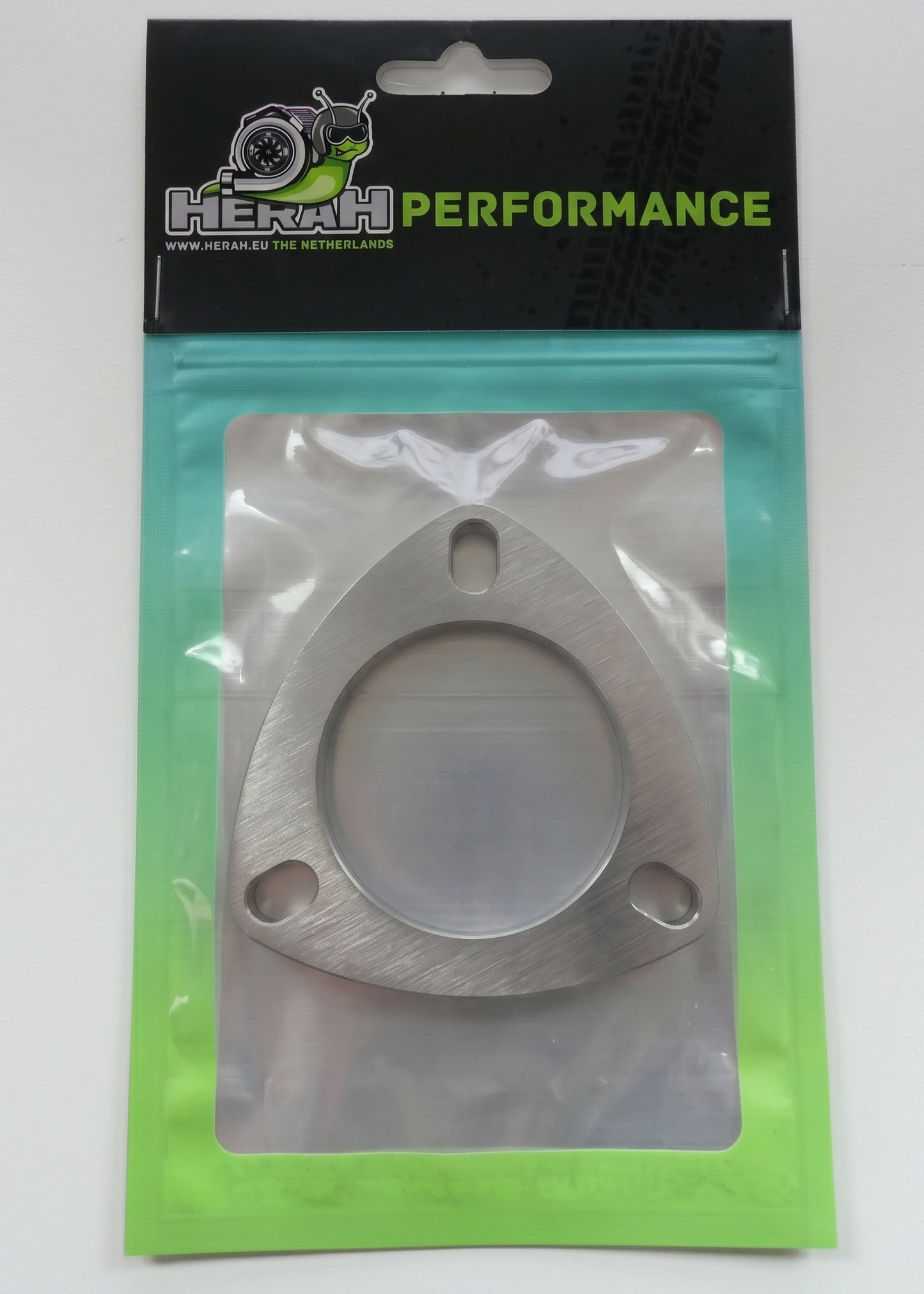 Turbo flange on a Herah Performance packaging with a clear window