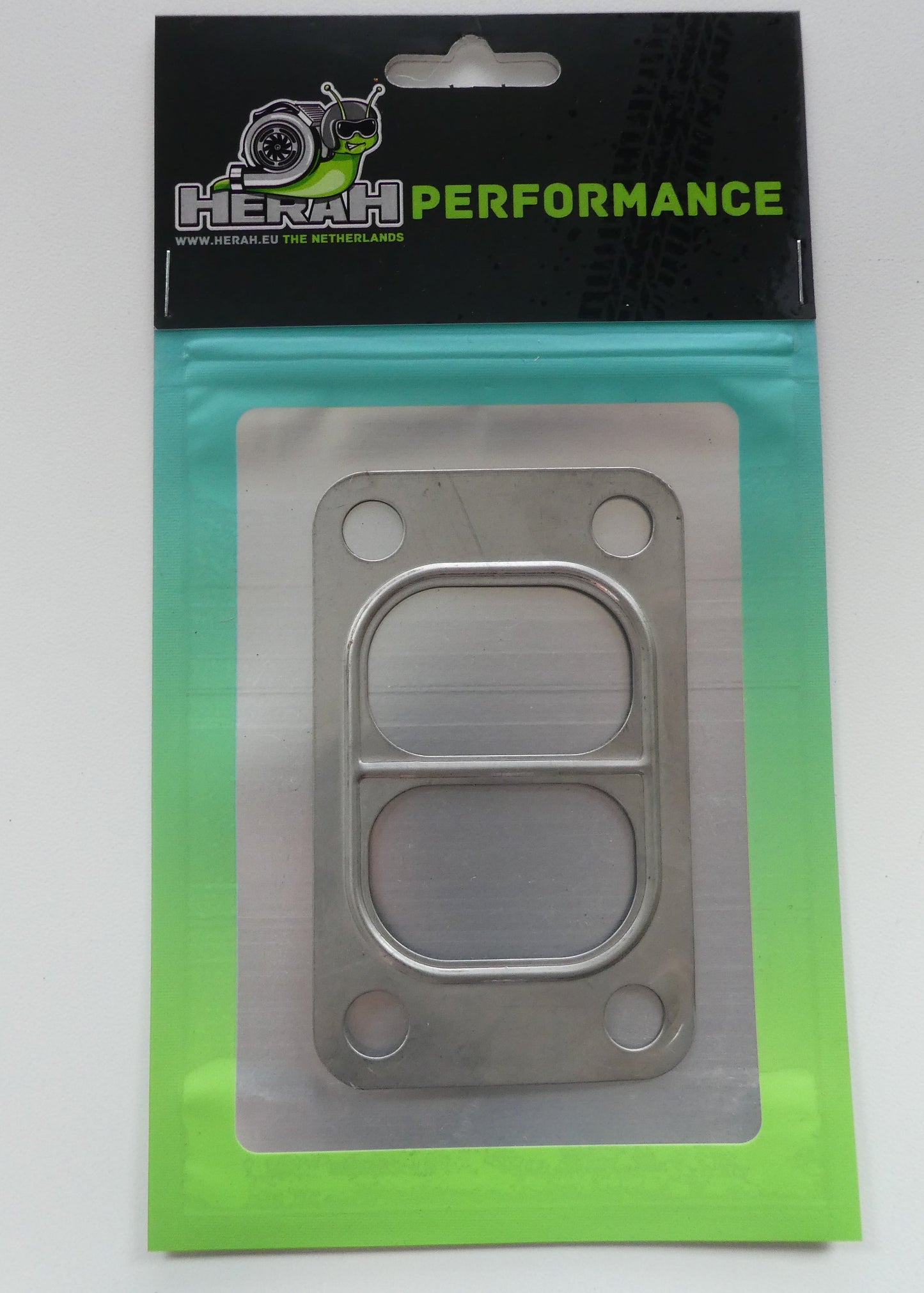 Metallic gasket in packaging with 'HERAH' branding on a white background