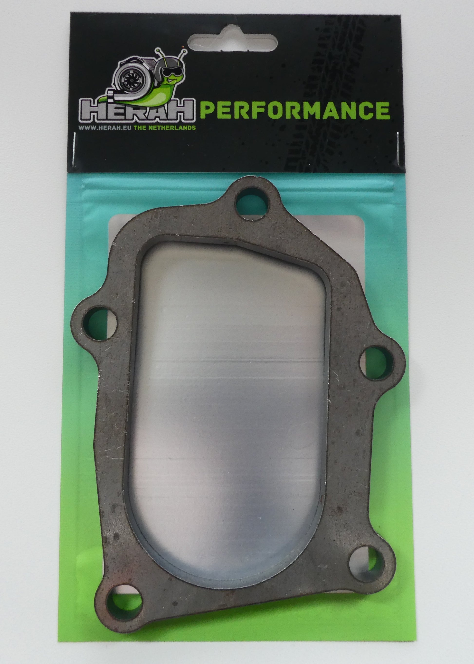 Gasket in packaging with 'HERAHPERFORMANCE' branding on a white background