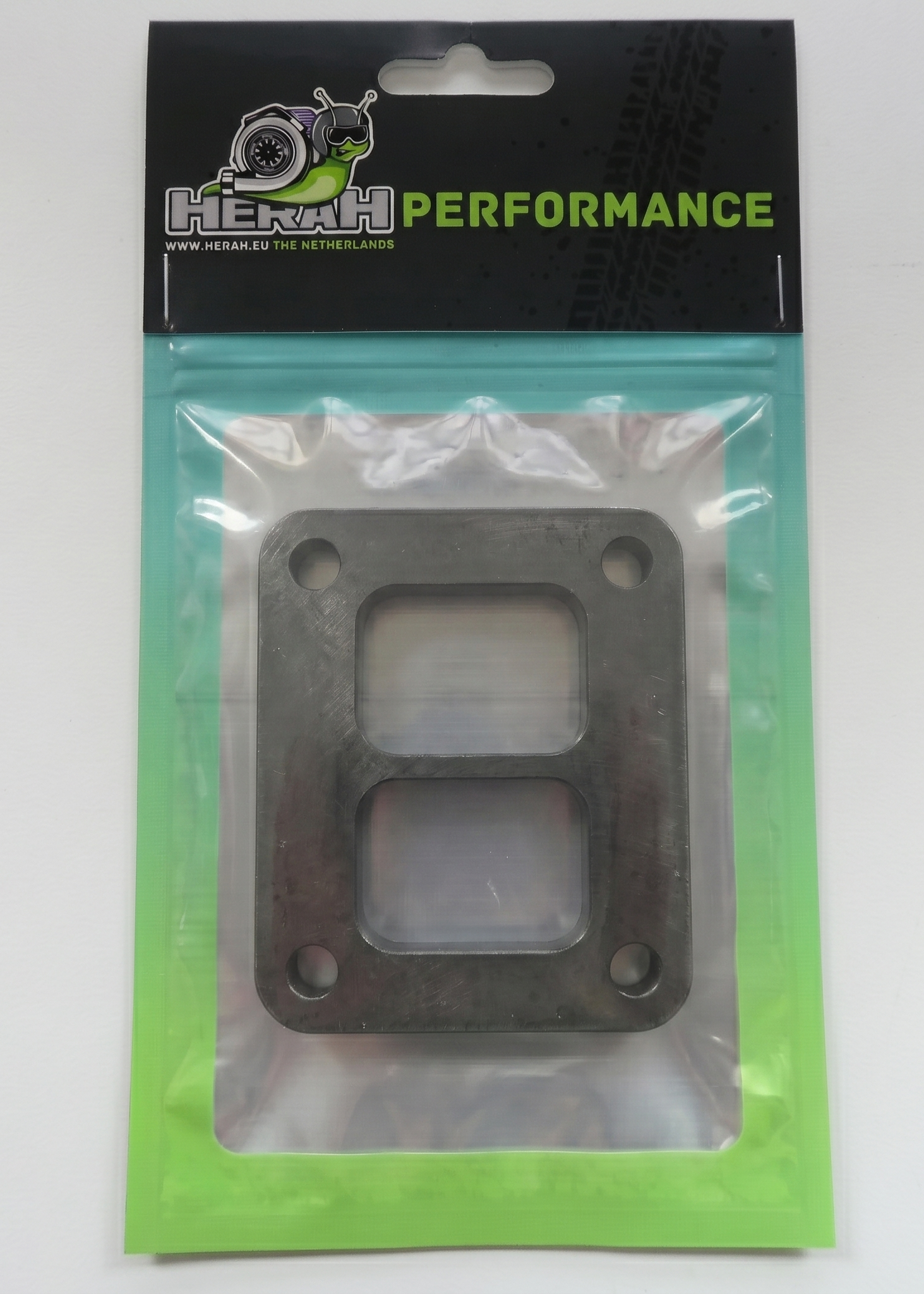 Turbo flange on a Herah Performance packaging with a clear window